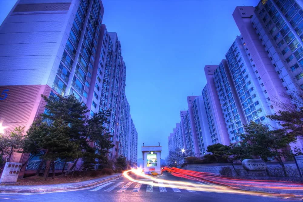 Korean apartment towers lining a shared entrance road