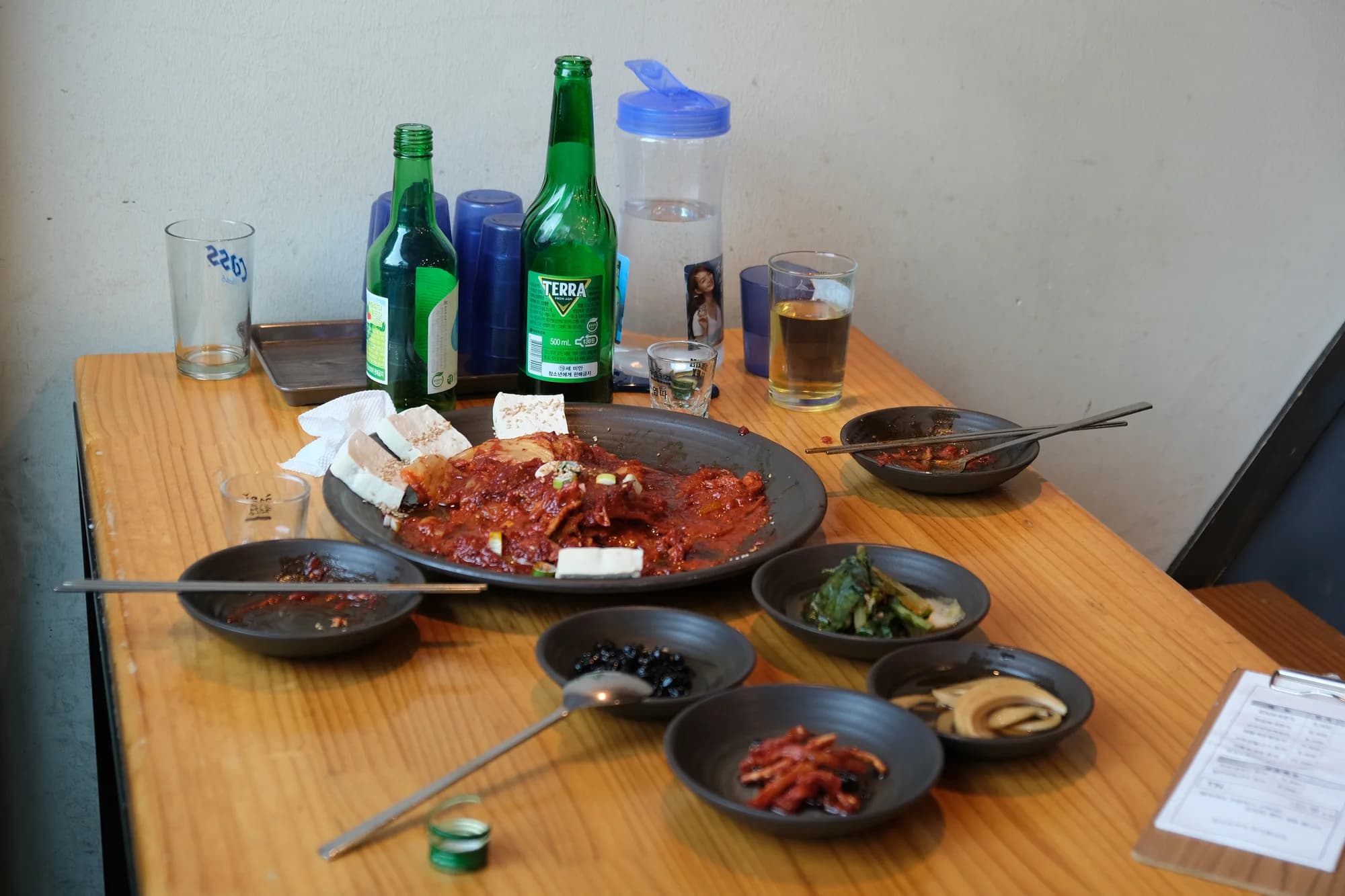 Lunch leftovers in bowls and plates at a Seoul restaurant
