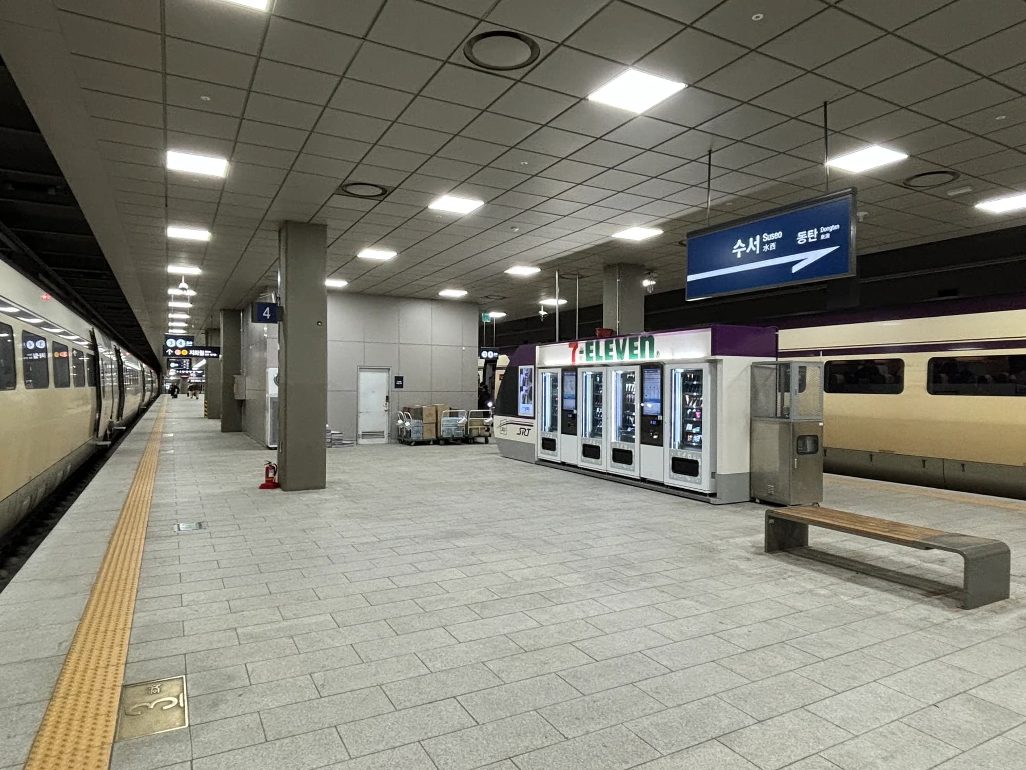 A platform nameboard and tracks inside Suseo high-speed rail station