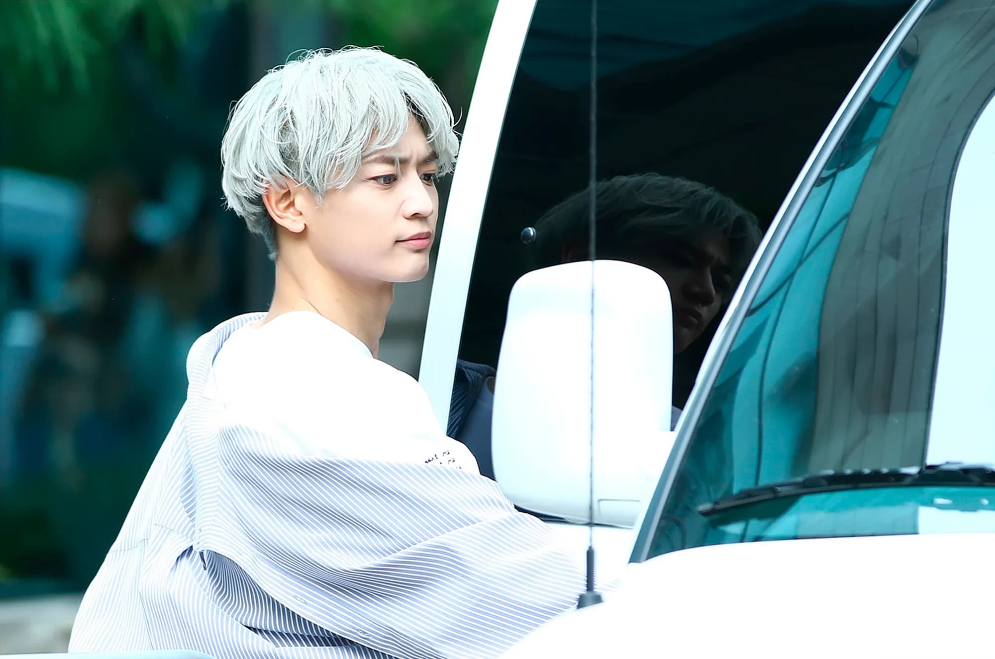 MINHO walking to a television recording in Seoul in October 2016