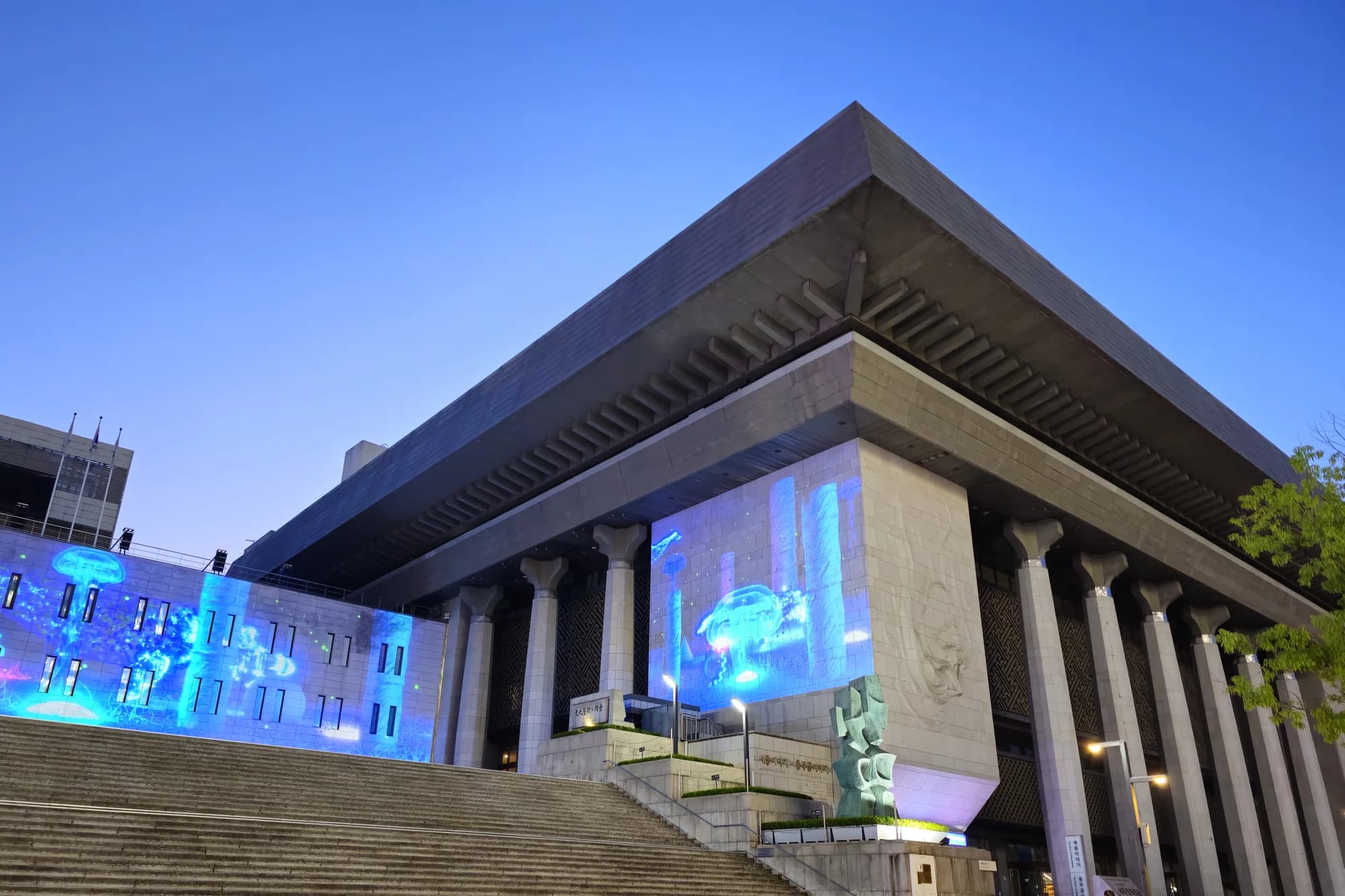 The Sejong Center for the Performing Arts illuminated at night in Seoul