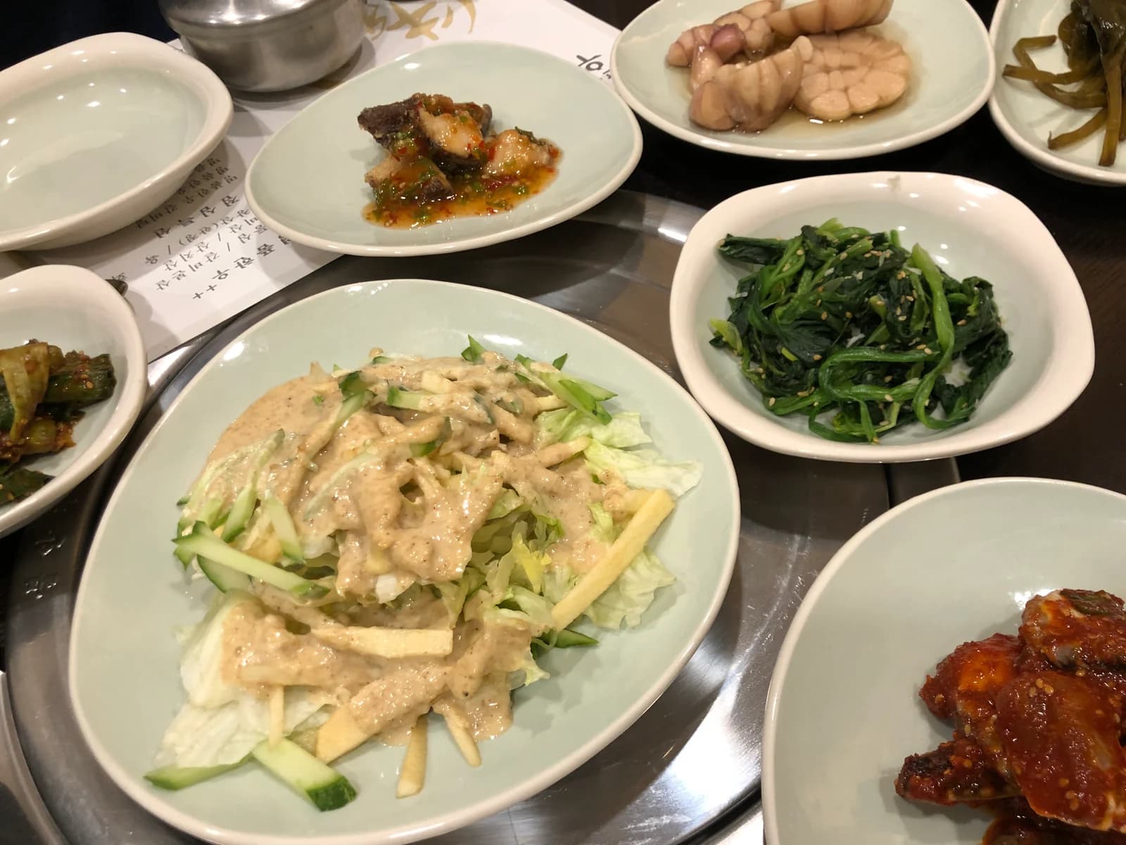 Korean side dishes arranged on a restaurant table in Wonju