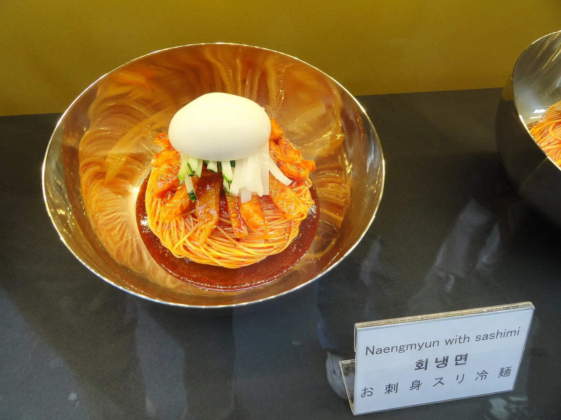 A bowl of hoe-naengmyeon cold noodles served in Seoul